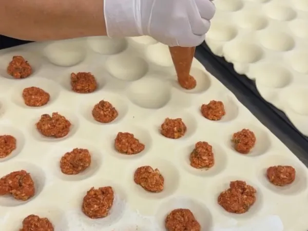 Nonna Tina's pies being made in the kitchen