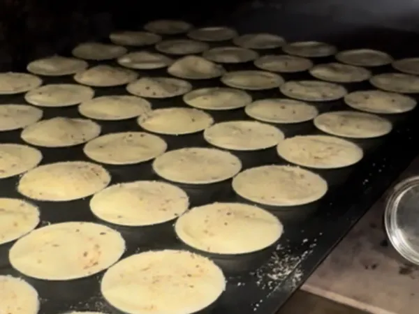 Nonna Tina's pies being made in the kitchen